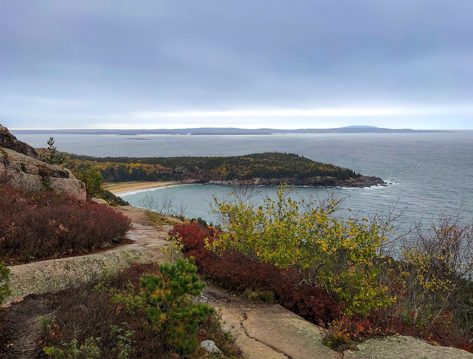 Hike the Precipice Trail in Acadia National Park for breathtaking views.