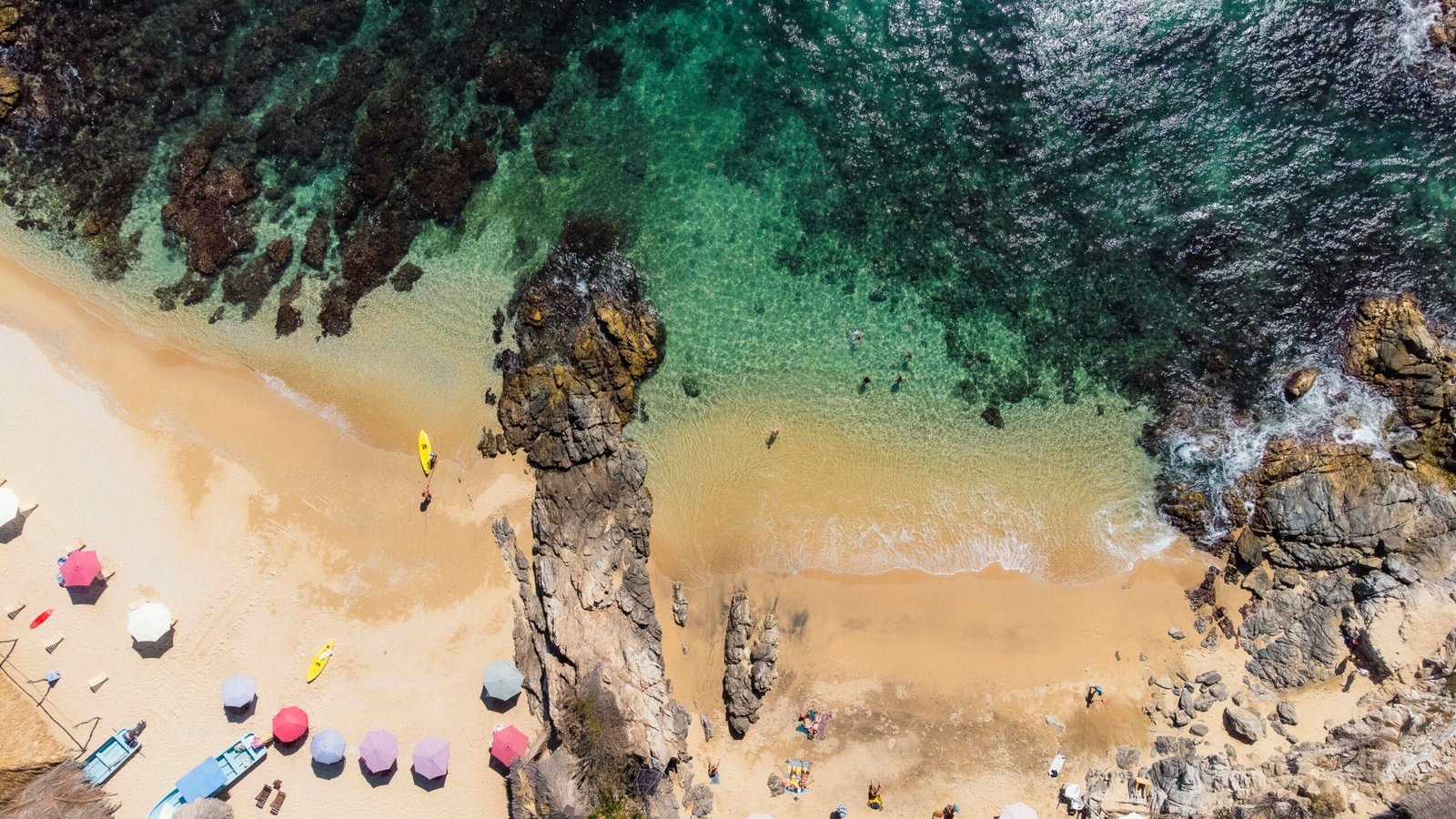 Relax on the sandy shores of Playa Hermosa, perfect for sunbathing.