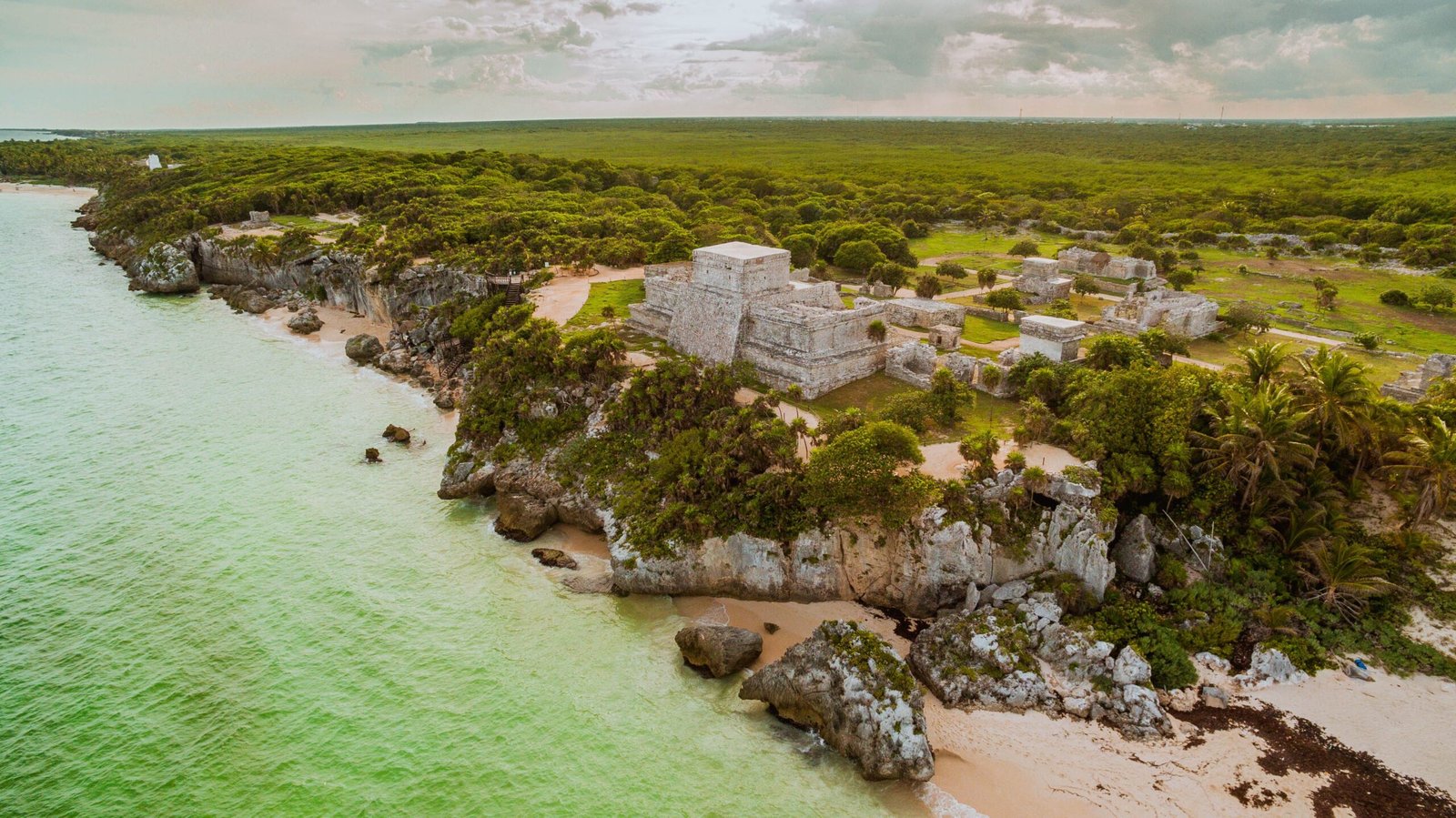 Visit the famous Tulum Cliffs for breathtaking sunset views