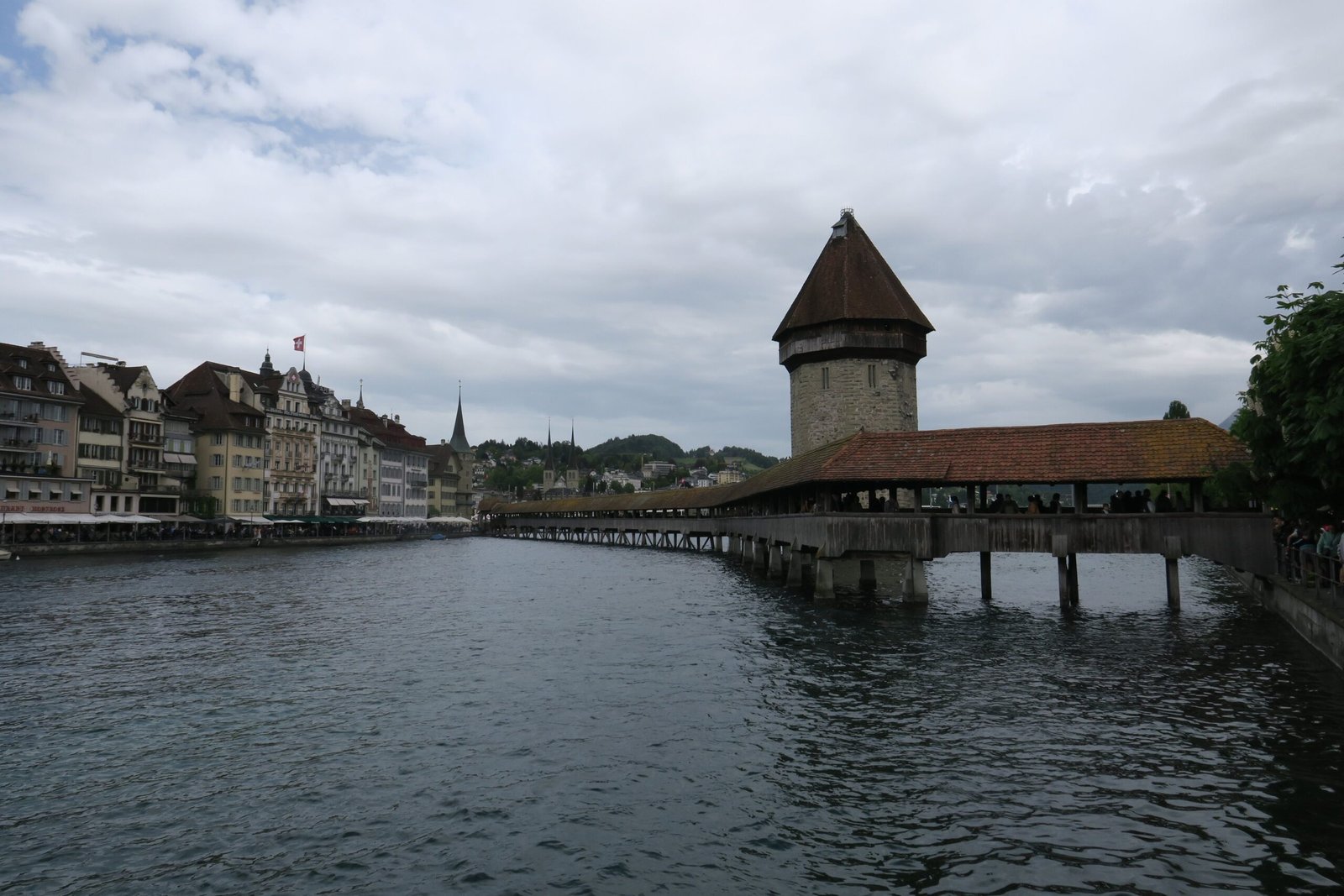 Visit the Chapel Bridge (Kapellbrücke) for stunning historical architecture