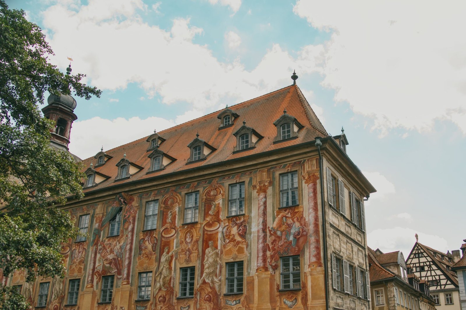 Stroll through the charming Old Town (Altstadt) with its vibrant frescoes