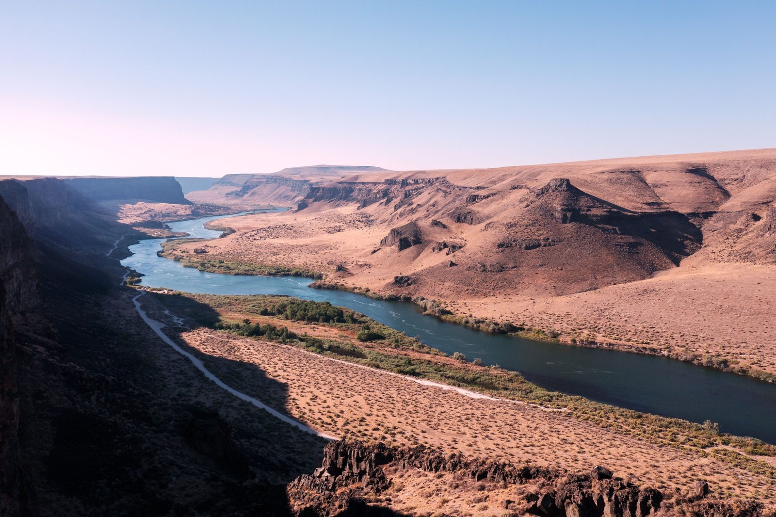 Explore the scenic Snake River Canyon Rim Trail for hiking and biking experiences.