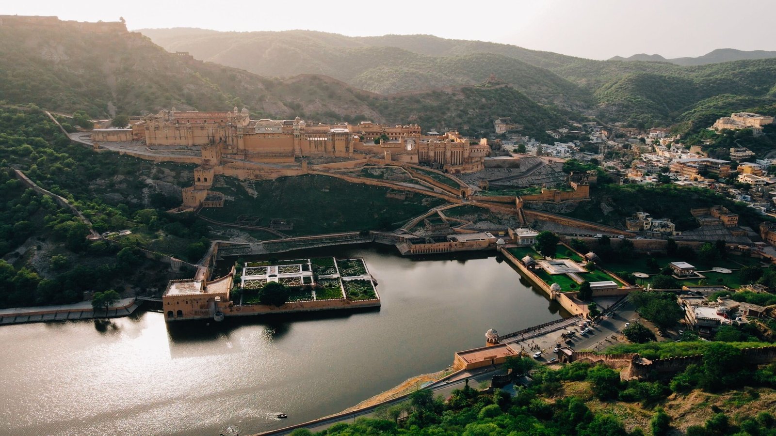 Explore the grand Amber Fort, featuring beautiful gardens and panoramic views of the surrounding hills.
