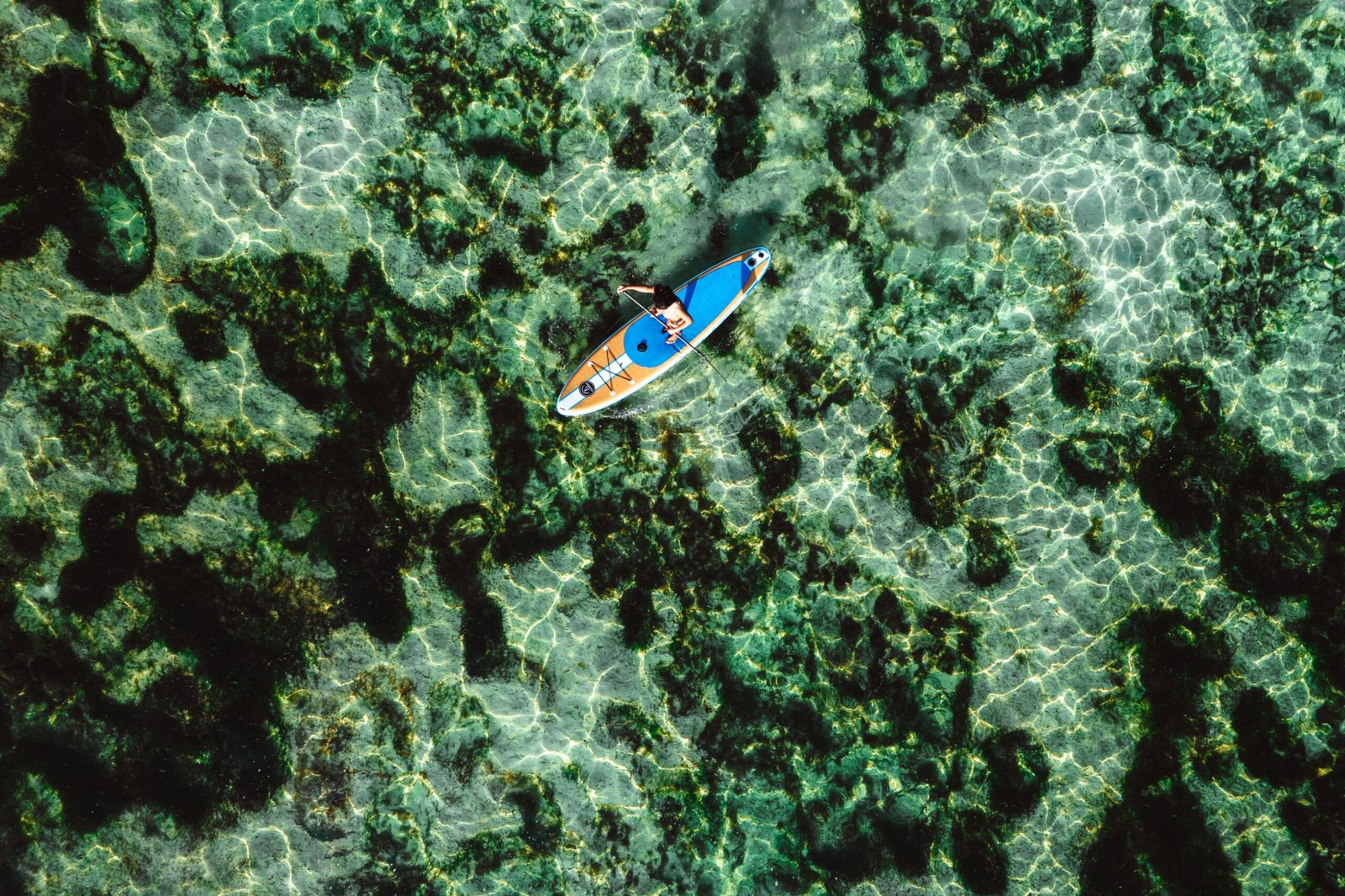 Take a paddleboard tour of the coastal waters with a local guide.