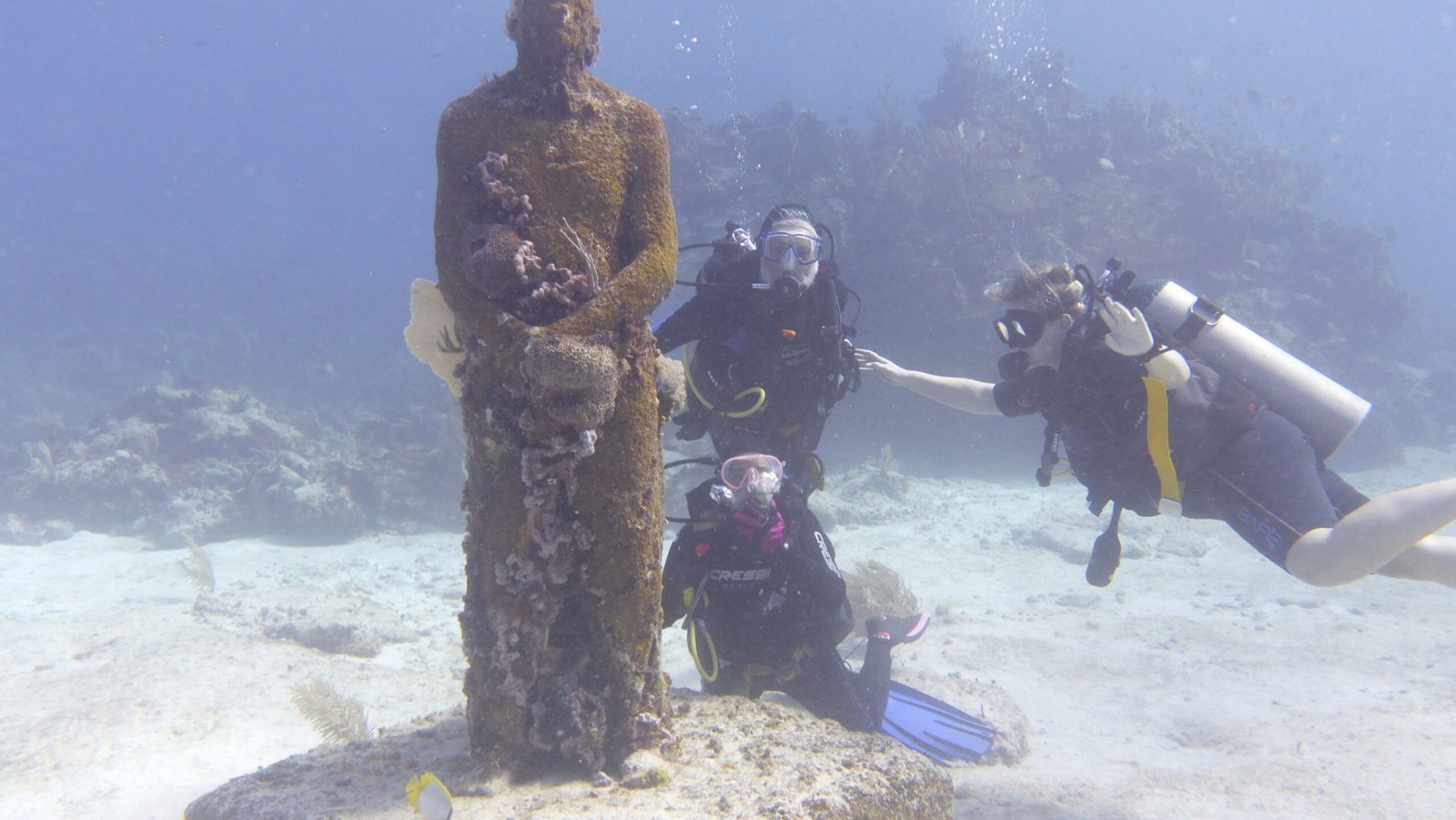 Enjoy snorkeling at the underwater sculpture park near Molinere Bay.