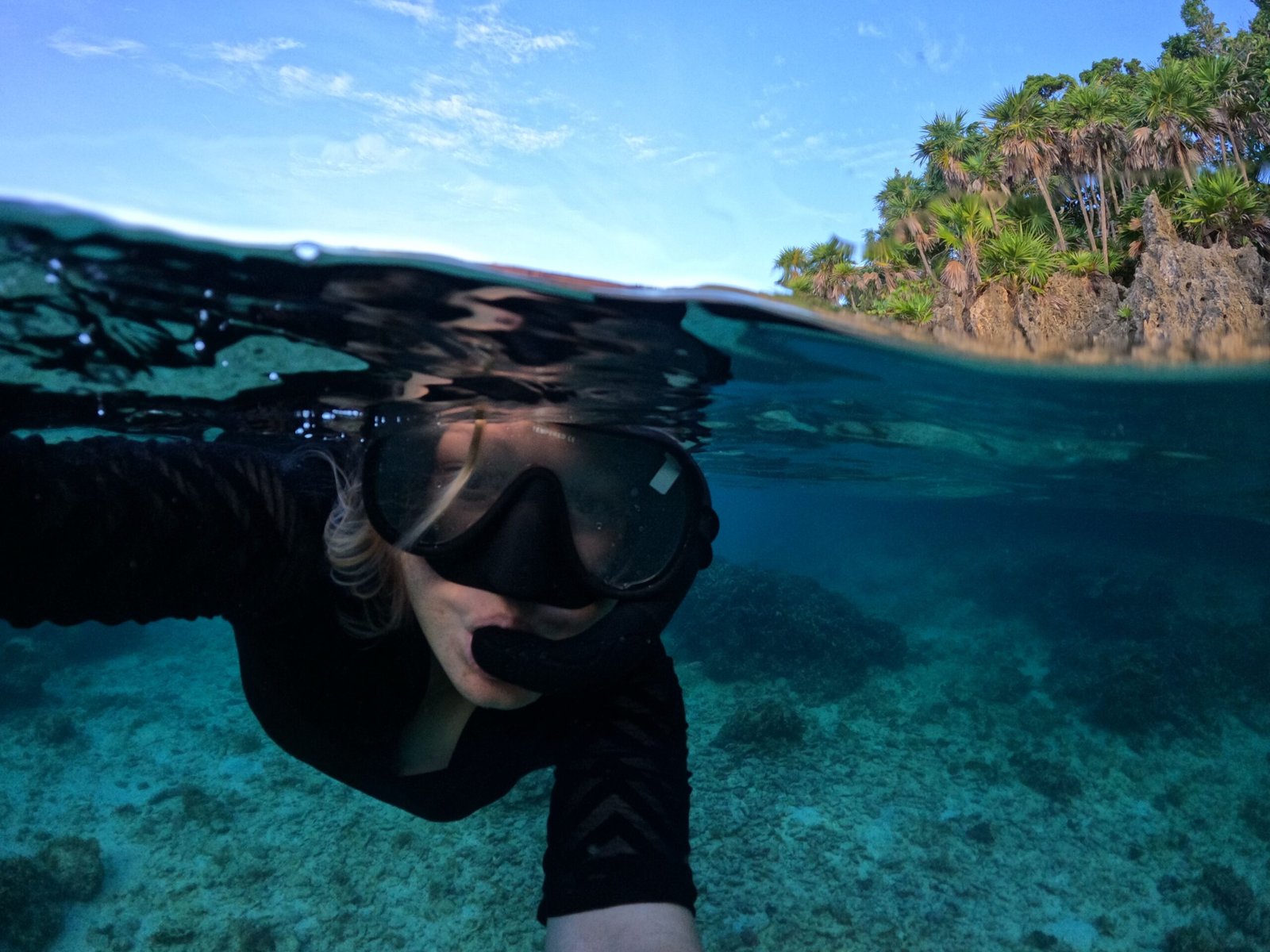 Snorkel in the clear waters of Little Bay