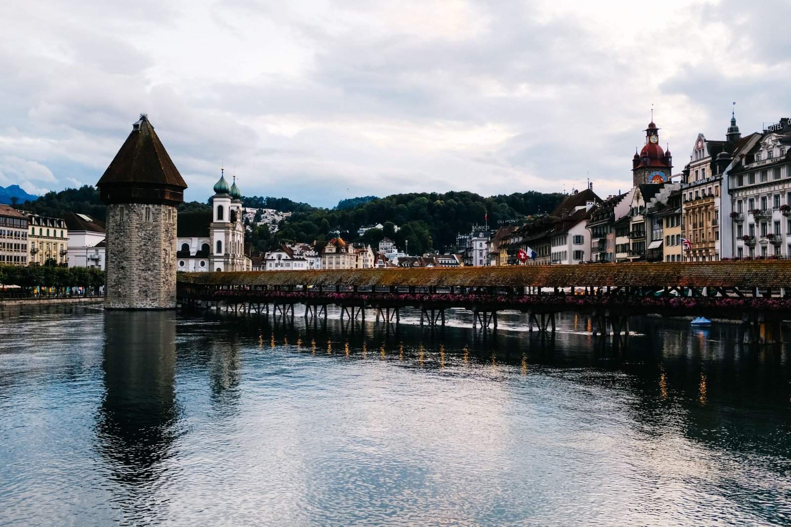 Stroll across the Chapel Bridge (Kapellbrücke) for stunning views of the Reuss River