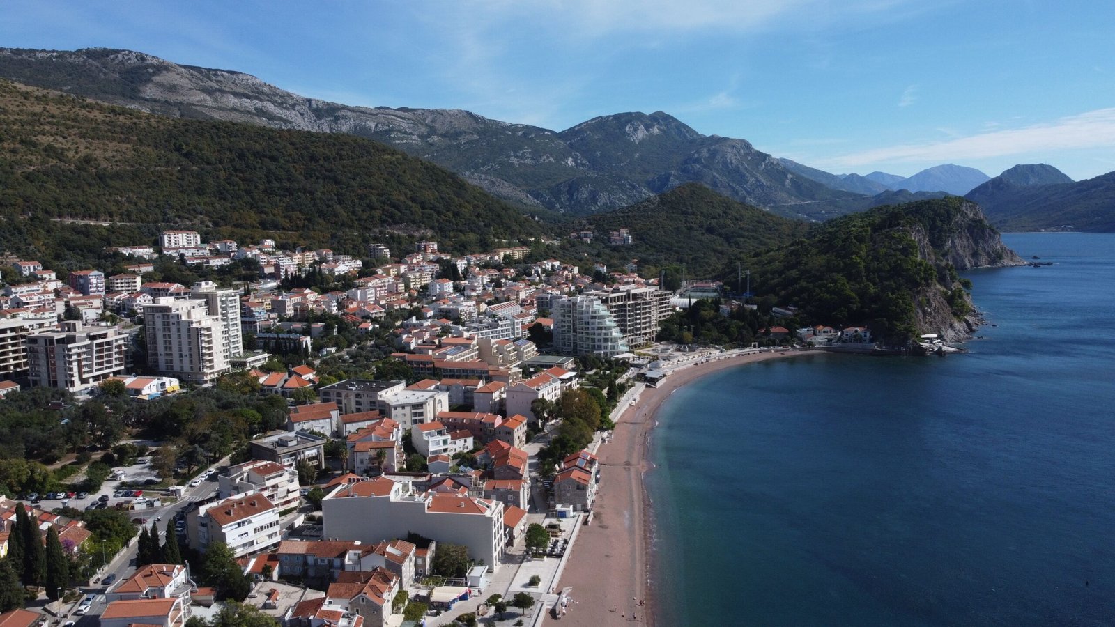 Relax on the beautiful beaches of Budva, known for its vibrant nightlife.
