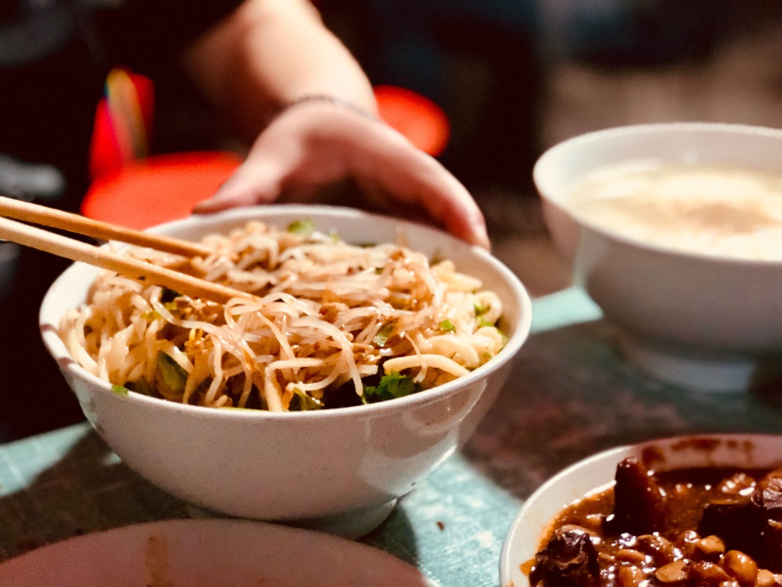 Enjoy authentic hand-pulled noodles at Xi’an Famous Foods.