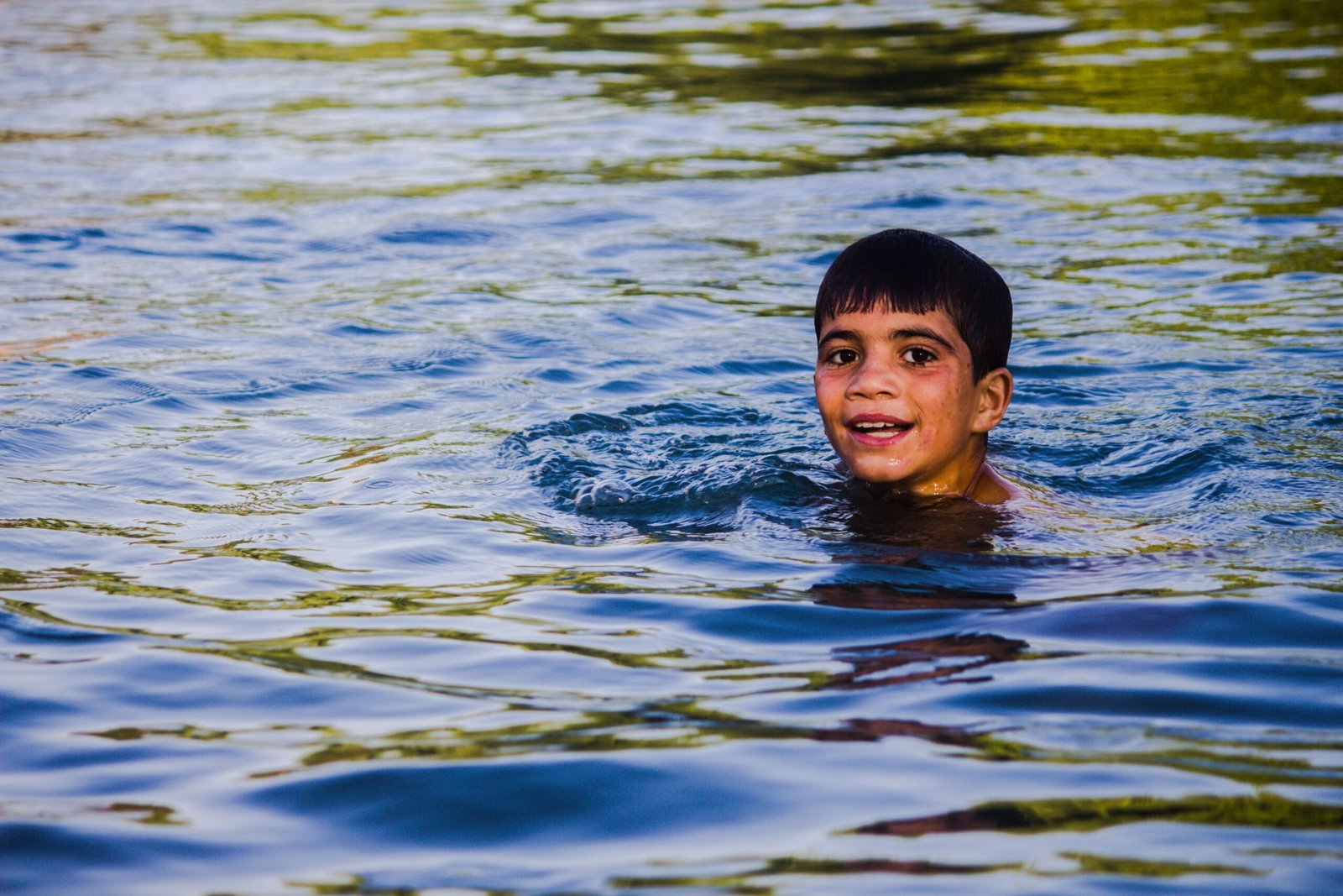 Spend a day at Xcaret Park, where kids can swim in underground rivers.