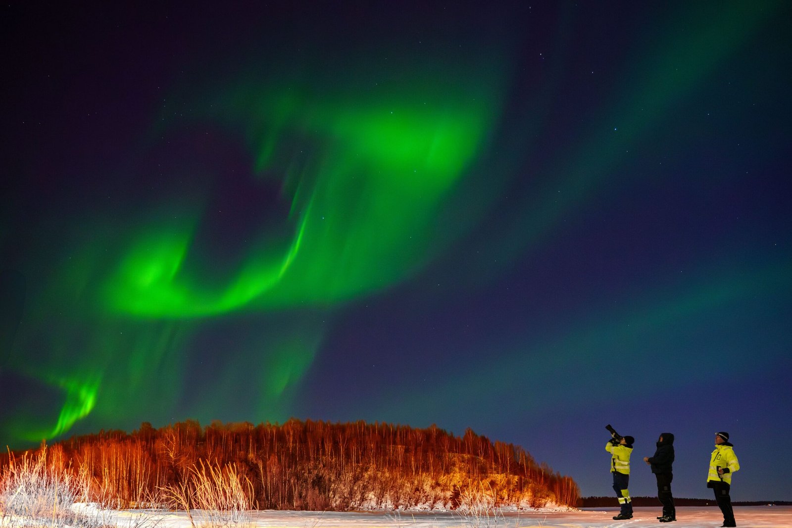 Experience the Northern Lights at a designated viewing area outside the city.