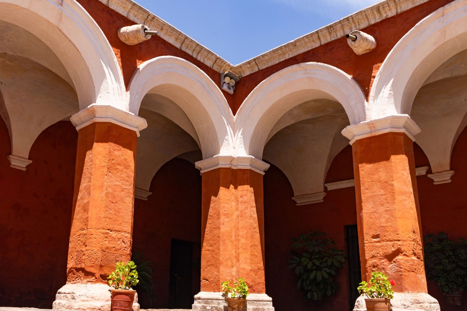 Visit the historic city of Granada and explore its colorful colonial architecture.