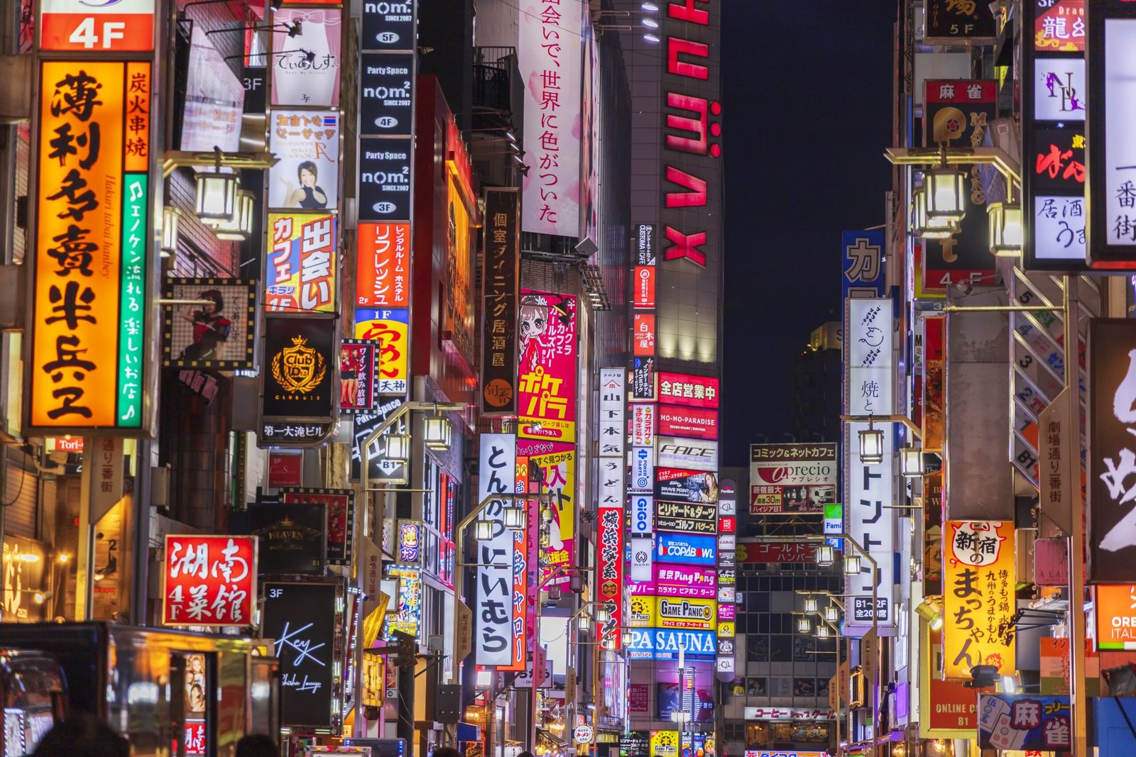 Experience the vibrant nightlife in Tokyo’s Shinjuku district.