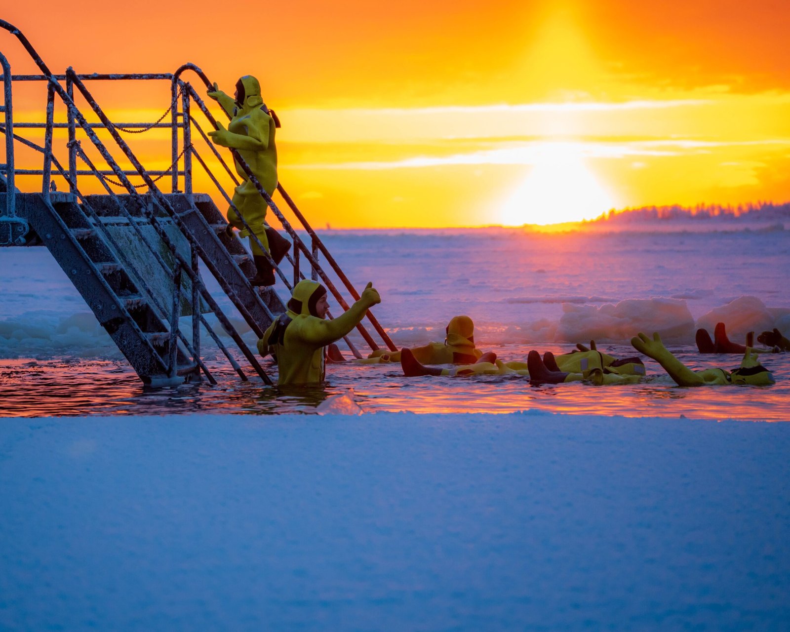Participate in the annual polar bear plunge at the community beach