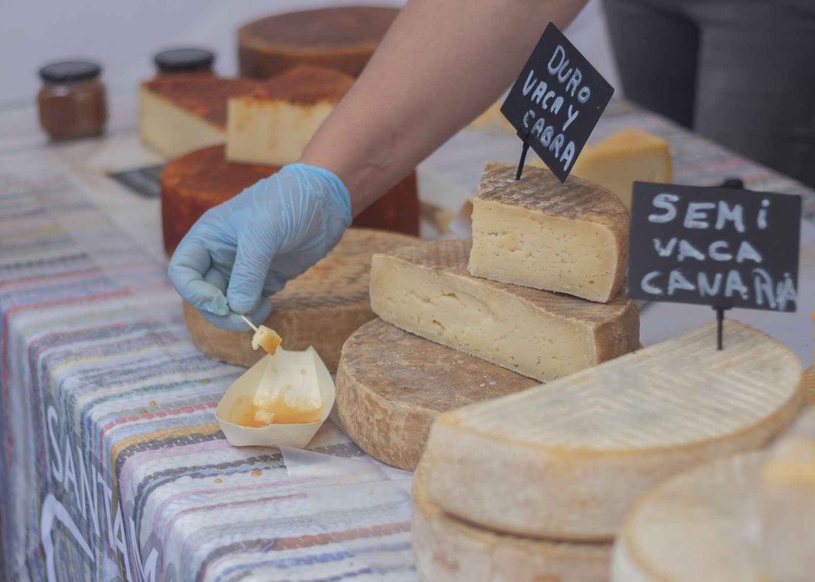 Sample local cheeses and wines at the Queijo São Jorge cheese factory.