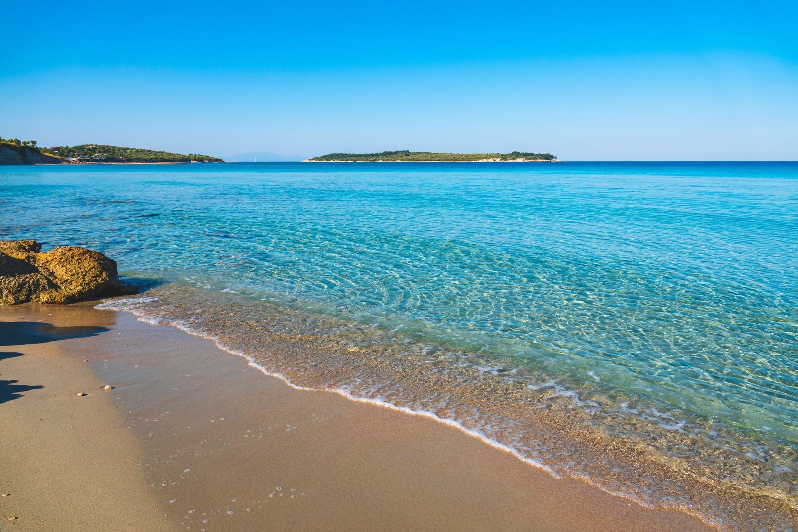 Relax on the pristine sands of Oak Island Beach.