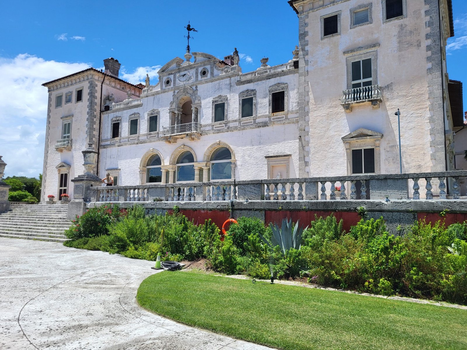 Explore the lush gardens at Vizcaya Museum and Gardens