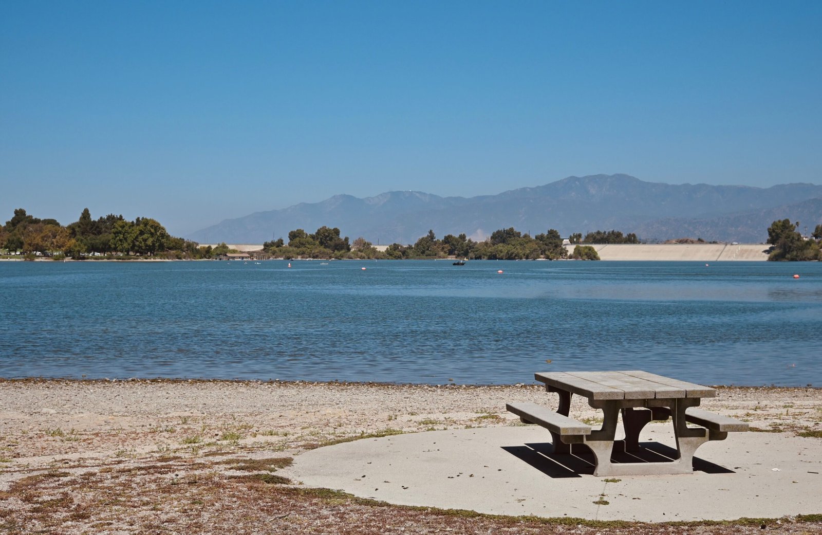 Visit the serene Lake Playola Park for a picnic and outdoor activities.