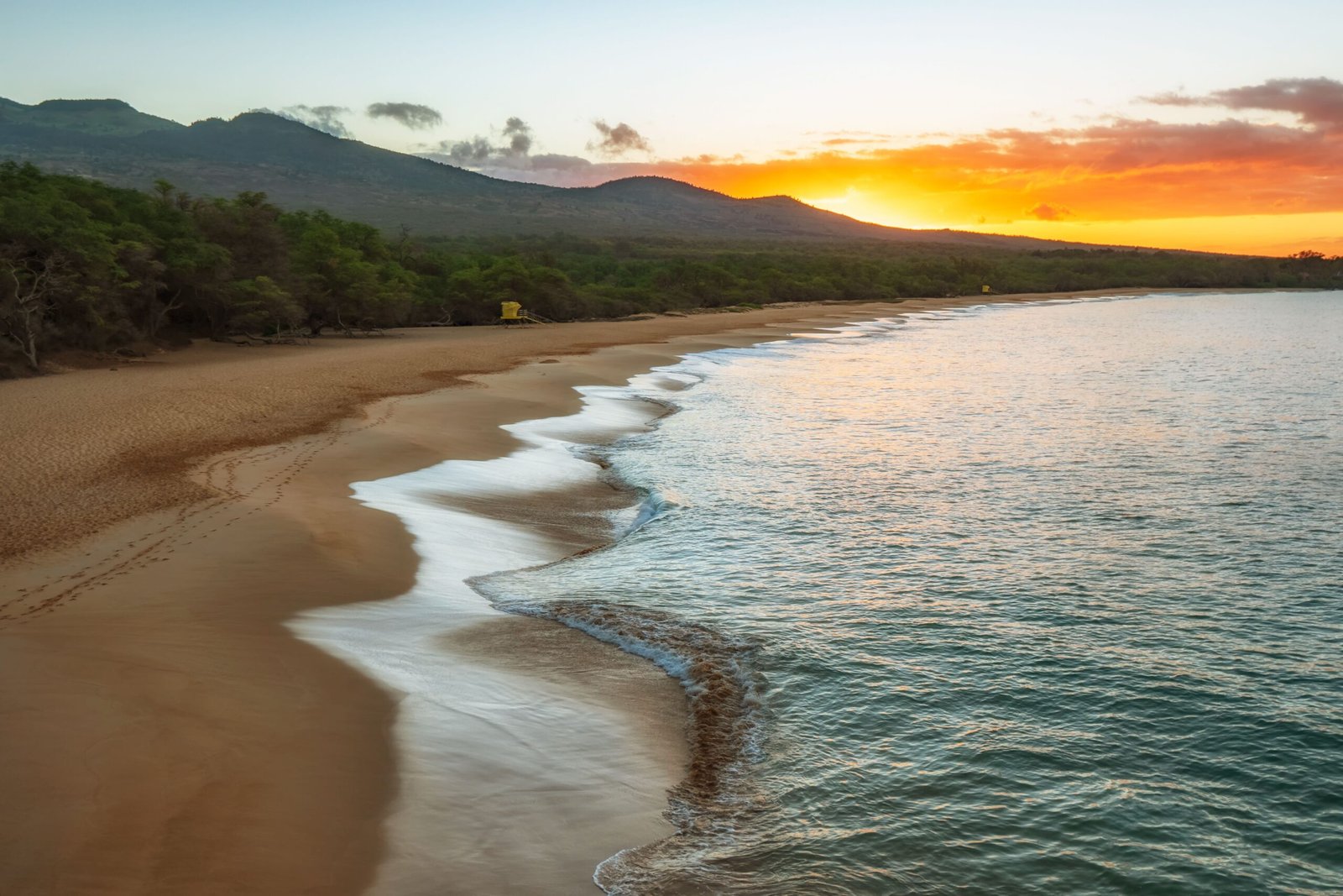 Watch the sunset from the Kihei Boat Ramp
