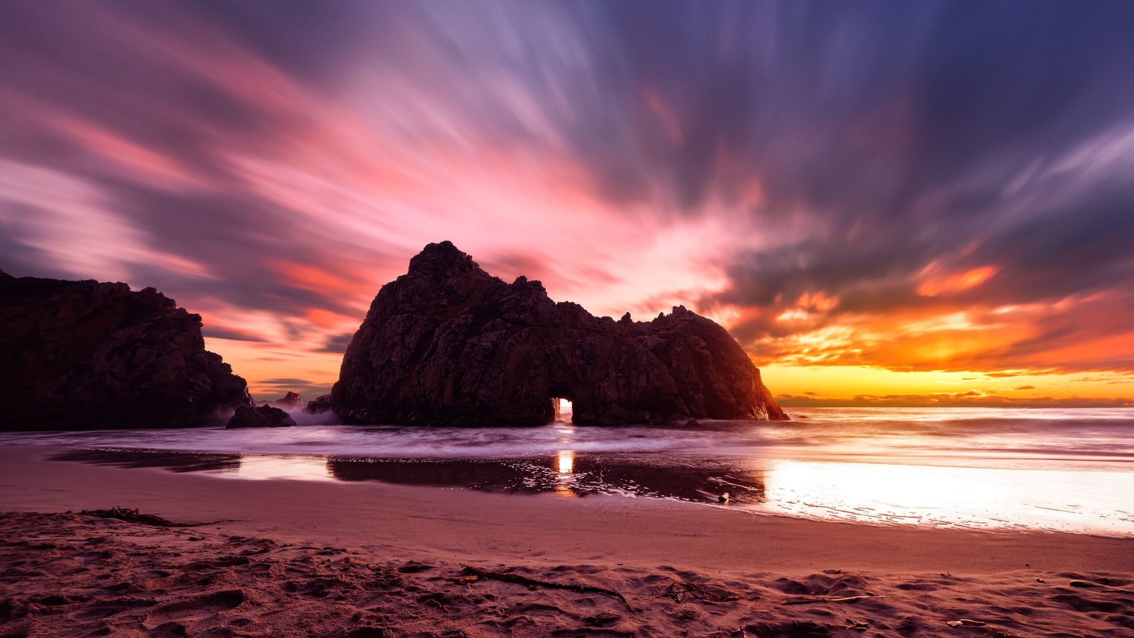 Visit Pfeiffer Beach and see the unique purple sand.