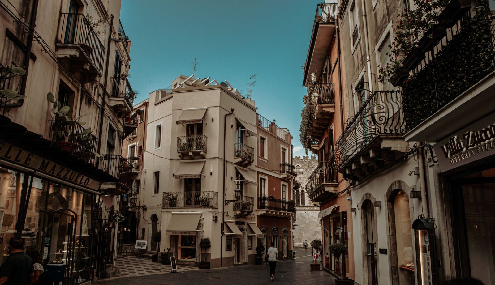 Stroll through the picturesque streets of Taormina’s historic center