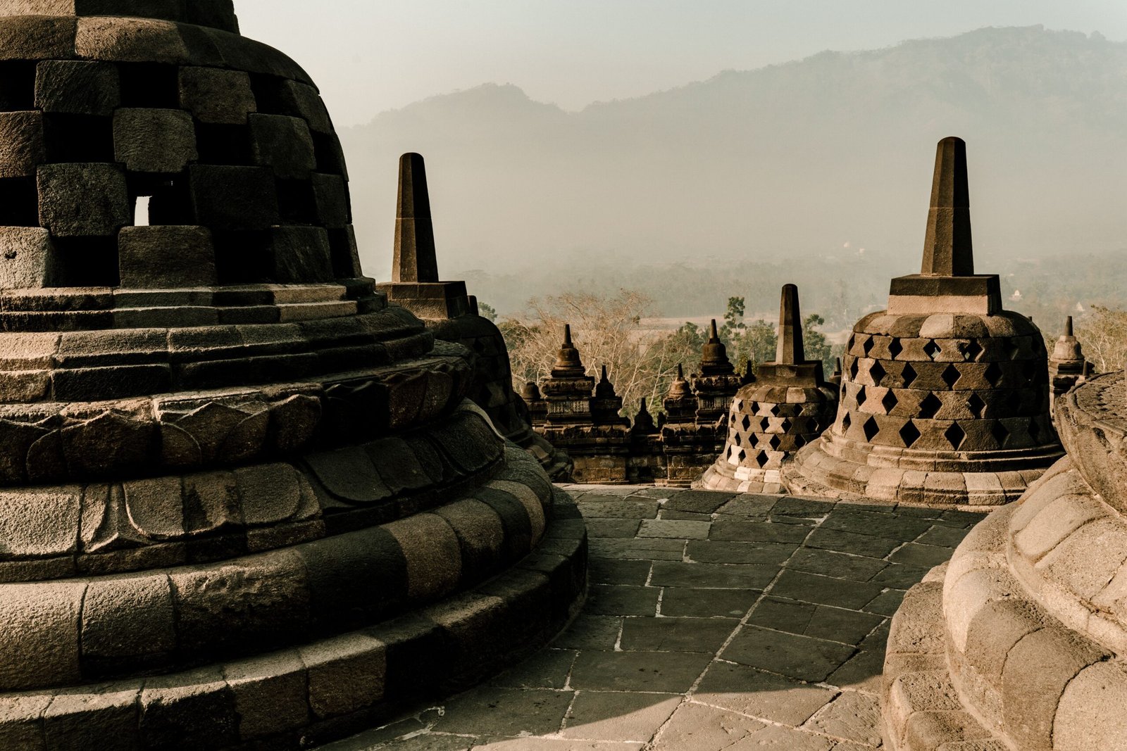 Explore the ancient temples of Borobudur in Java